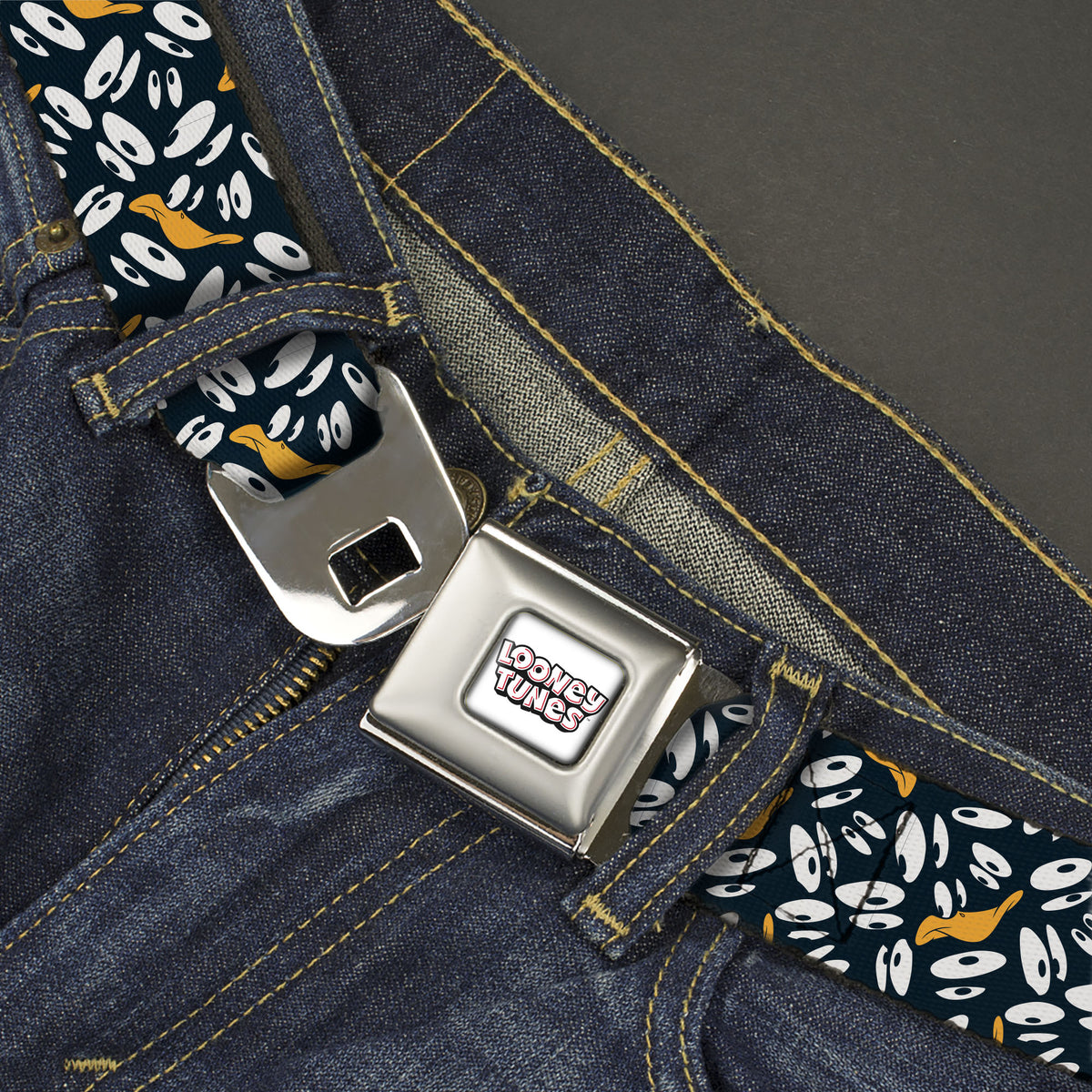 LOONEY TUNES Text Title Logo Full Color White Seatbelt Belt - Daffy Duck Expression and Eyes Scattered Black/White Webbing Seatbelt Belts Looney Tunes