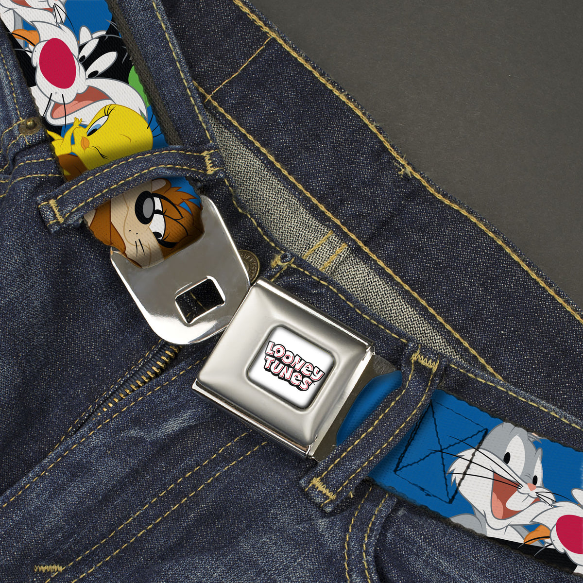 LOONEY TUNES Text Title Logo Full Color White Seatbelt Belt - Looney Tunes Seven Character Faces Stacked Blue Webbing Seatbelt Belts Looney Tunes