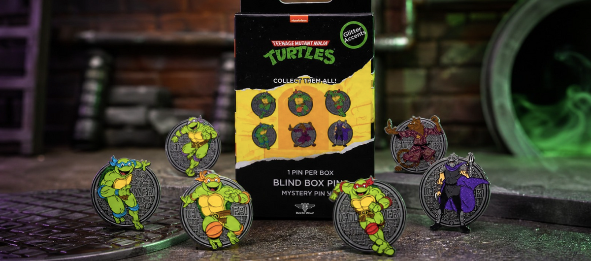 Blind box mystery pins from the brand 'Buckle-Down' featuring Nickelodeon's TMNT leonardo, michelangelo, raphael, donatello, the shredder and master splinter 